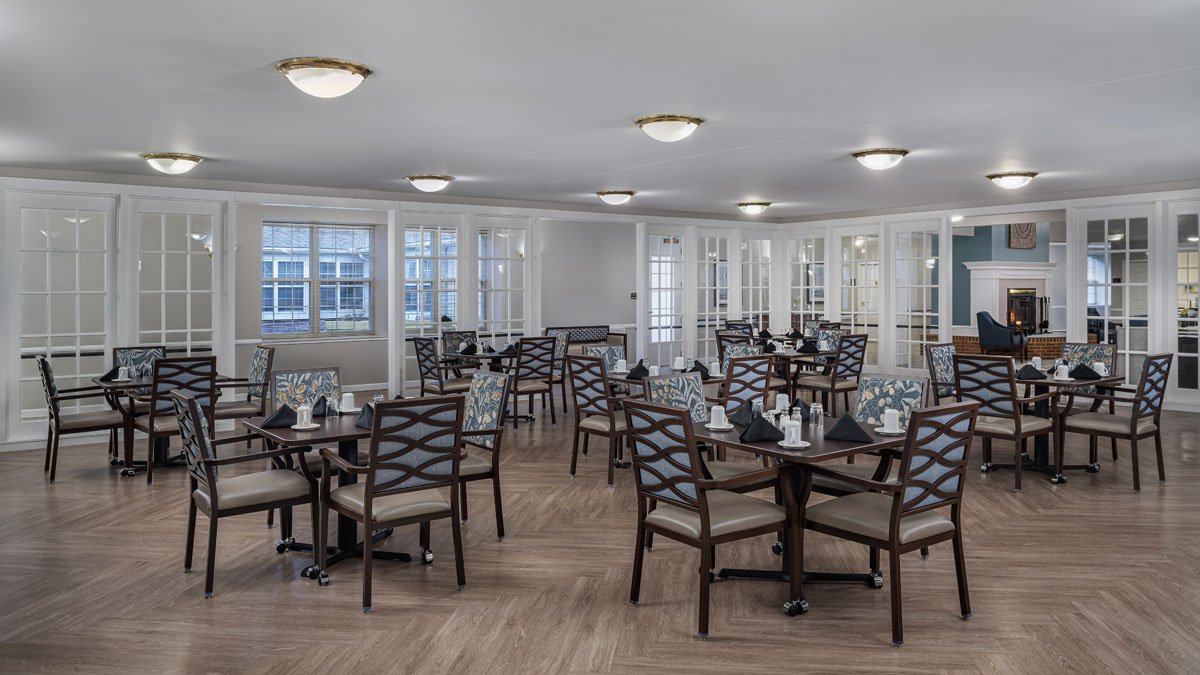 dining area with multiple tables, cropped